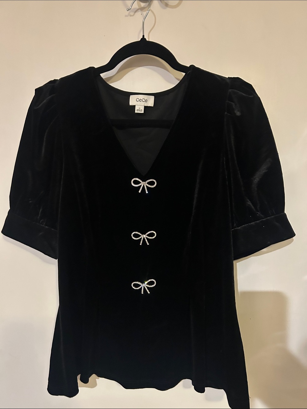 CeCe Black Velvet Long Sleeve V-Neck Top with Bow Accents